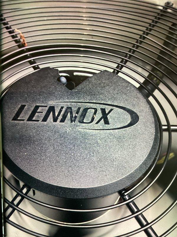 Completed MVP cooling maintenance visit on Lennox HVAC unit. Inspected system following customer concerns about potential wind damage, verified fan assembly and protective grille were intact and properly secured with no visible damage. Checked electrical components including cartridge fuses, confirmed all three fuses were properly seated in mounting bracket with correct amperage ratings and showed no signs of failure or damage.