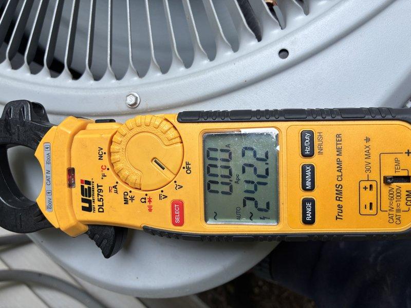 Completed comprehensive AC tune-up including electrical performance testing and component inspection. Measured amperage draw on condenser fan motor using clamp meter, verifying proper operation at 9.2 amps, and confirmed contactor functionality with all wire connections secure and terminals properly tightened.