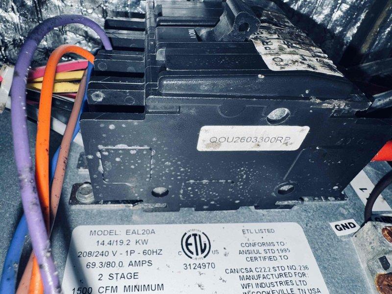 Completed scheduled maintenance on 9-year-old geothermal cooling system. Inspected electrical connections at control panel, verified proper wire terminations at contactor terminals T1/T2 and L1/L2, and examined air handler blower motor assembly rated at 14.4/19.2 AMP, 208/240V, 1500 CFM. All components operating within manufacturer specifications with no deficiencies noted.