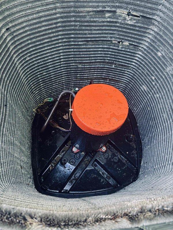 Replaced sound insulator on HVAC system. Upon inspection, observed heavy frost accumulation on refrigeration lines indicating potential airflow restriction or refrigerant issue related to deteriorated insulation. Removed old, damaged sound insulator from ductwork and installed new replacement component with orange service cap. Verified proper installation and system operation upon completion.
