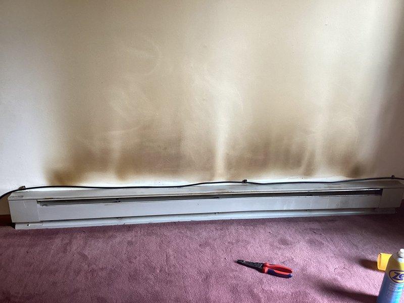 Performed cleaning and inspection of two electric baseboard heaters located in the living room. Removed dust and debris from heating elements and ventilation slots to restore proper airflow and heating efficiency. Verified proper operation of units upon completion.