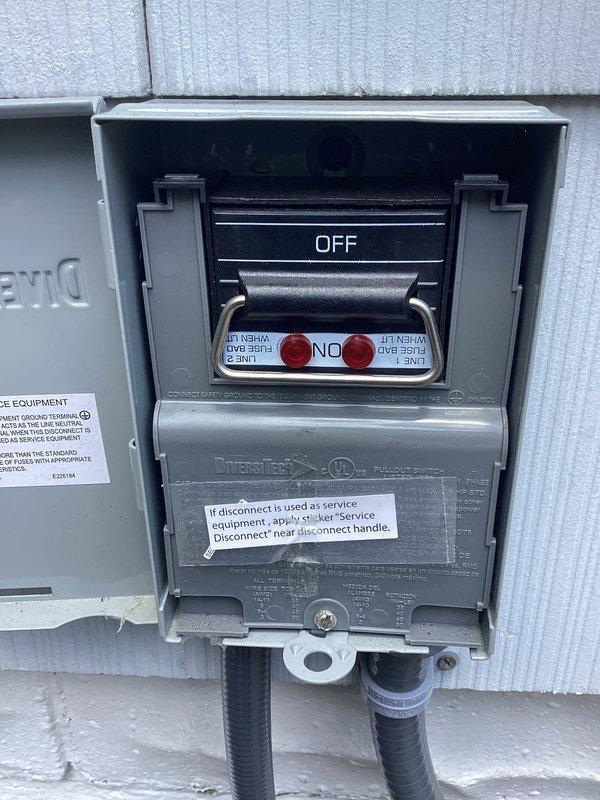 Responded to no cooling complaint on first use of system. Upon arrival, found disconnect switch in OFF position at outdoor unit. Verified blown fuses in disconnect box using clamp meter for electrical diagnostics. Replaced failed fuses, restored power to unit, and confirmed system operation with proper cooling functionality established.