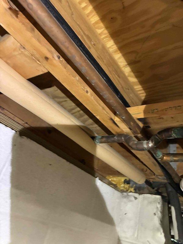 Installed dedicated A/C circuit with new 8-position subpanel to provide adequate electrical capacity for air conditioning system. Routed electrical wiring through attic space and between floor joists, securing cables properly to structural members while maintaining code-compliant clearances. Completed all connections, verified proper circuit operation, and ensured installation met current electrical standards.