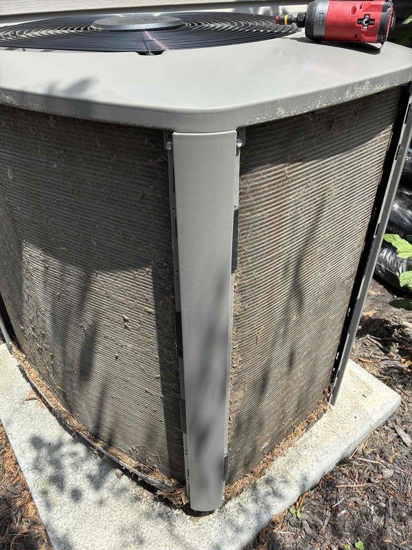 # HVAC Maintenance - Cooling

Completed MVP recurring maintenance visit on a 4-year-old residential air conditioning system. Performed comprehensive inspection of outdoor condenser unit, including examination of cabinet panels, protective grilles, and fan assembly. Unit showed normal operational wear with accumulated dirt, dust, and environmental debris on exterior surfaces and coil fins. Condenser positioned on concrete pad with adequate clearance; noted minor vegetation growth near base and organic debris accumulation on pad surface. Fan motor and blade assembly inspected and found to be operational. Documented current condition of unit exterior panels showing weathering and soiling consistent with outdoor installation. All major components visually assessed for proper operation and structural integrity.