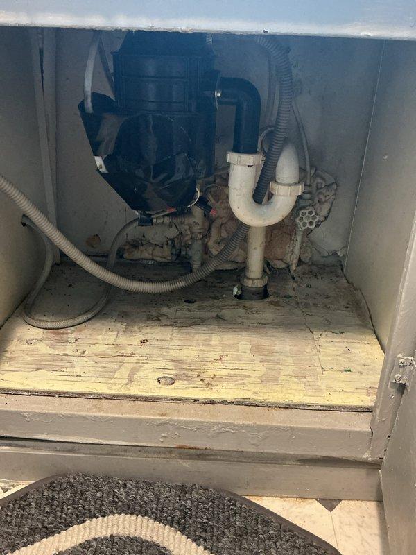 Performed site assessment for dishwasher installation plumbing requirements. Evaluated existing under-sink plumbing configuration, including disposal unit, drain trap assembly, and available water supply connections. Provided estimate for installation of dedicated dishwasher supply line with appropriate shut-off valve and drain connection to existing waste system.