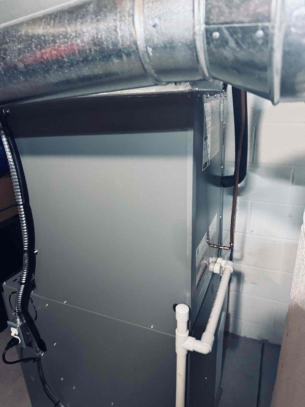 Responded to service call for newly installed Lennox air conditioning system not cooling entire home on first use since November 2025 installation. Upon arrival, performed visual inspection of outdoor condensing unit and indoor air handler. Verified unit placement, electrical connections, and refrigerant line installation appeared proper with no obvious physical damage or installation defects. System components showed normal operational status with no immediate fault indicators present.