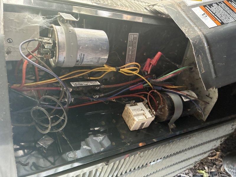 Completed preventive maintenance inspection on residential air conditioning system for MVP customer. Performed thorough examination of blower assembly, motor components, and electrical connections including capacitor and control relays. Documented system condition with detailed photographs showing blower wheel, internal wiring, and electrical components all operating within normal parameters.