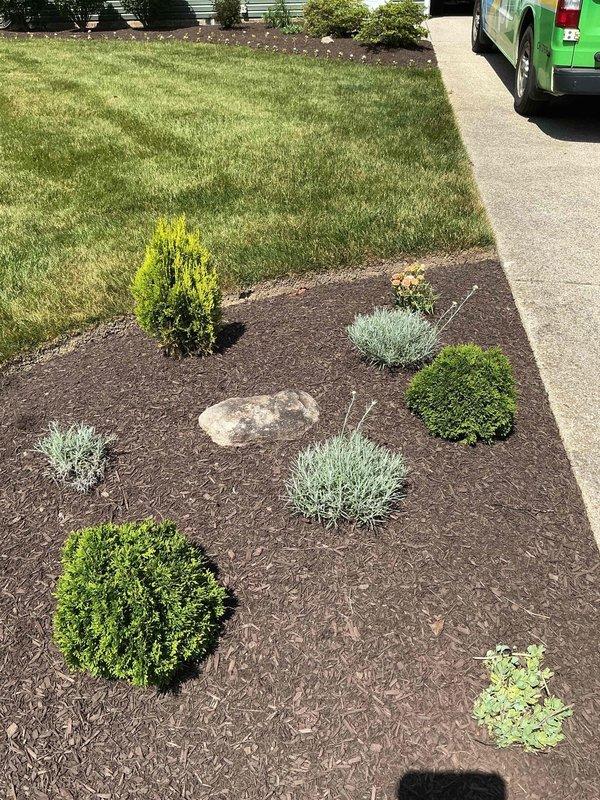 Conducted on-site evaluation for installation of exterior light pole at end of driveway. Assessed existing landscape conditions, electrical routing requirements, and optimal placement location. Documented site conditions including landscaped areas, concrete surfaces, and underground utility considerations for future installation planning.