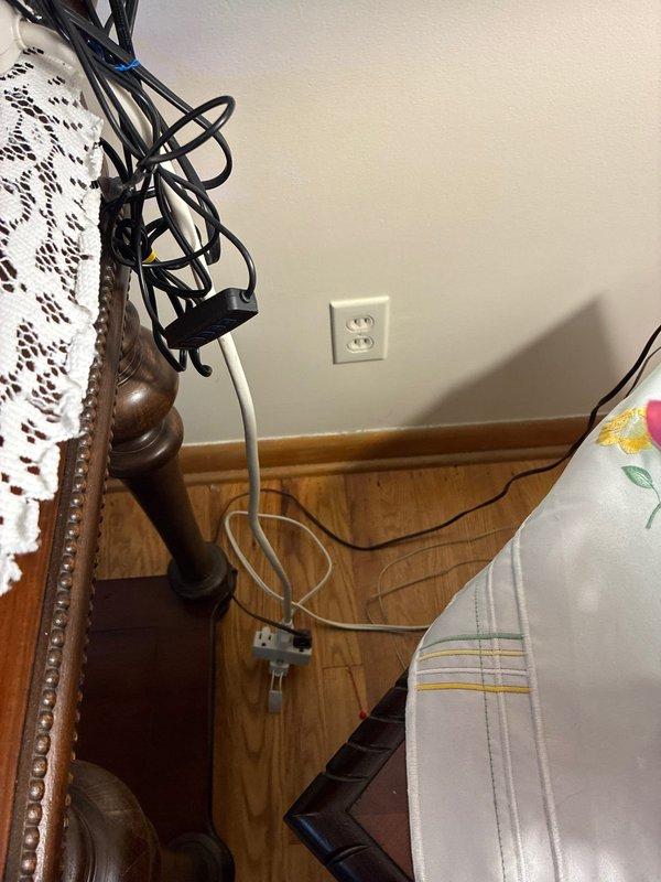 Responded to no power complaint in living room outlet. Upon arrival, tested outlet and confirmed loss of power. Inspected circuit connections, identified and resolved issue at outlet terminal where loose wiring had caused loss of continuity. Restored power to outlet, verified proper operation, and confirmed all connected devices functioning normally.