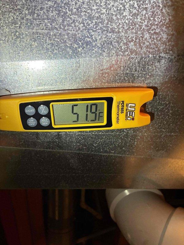 Completed MVP cooling maintenance visit on 4-year-old system. Performed comprehensive inspection of electrical components, verifying all wire connections, terminal blocks, and capacitors for proper operation. Measured and confirmed suction line temperature at 57.9°F, indicating adequate refrigerant charge and system performance. All electrical connections secure with no signs of overheating or deterioration. Unit operating within normal parameters with no deficiencies noted.