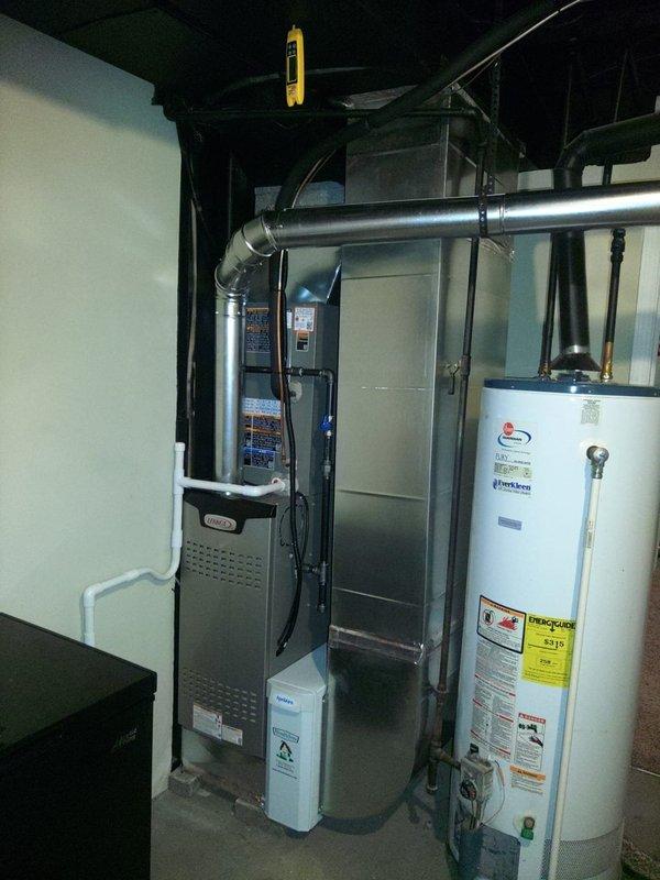 Completed installation of 80% AFUE gas furnace configured on high airflow base setting to optimize system performance and airflow delivery. Installed smart sensor integration with S40 thermostat control platform to enable enhanced zoning capabilities and temperature management throughout the conditioned space. Verified proper system operation with ambient temperature reading of 75.2°F and confirmed all equipment connections, ductwork transitions, and control wiring per manufacturer specifications.