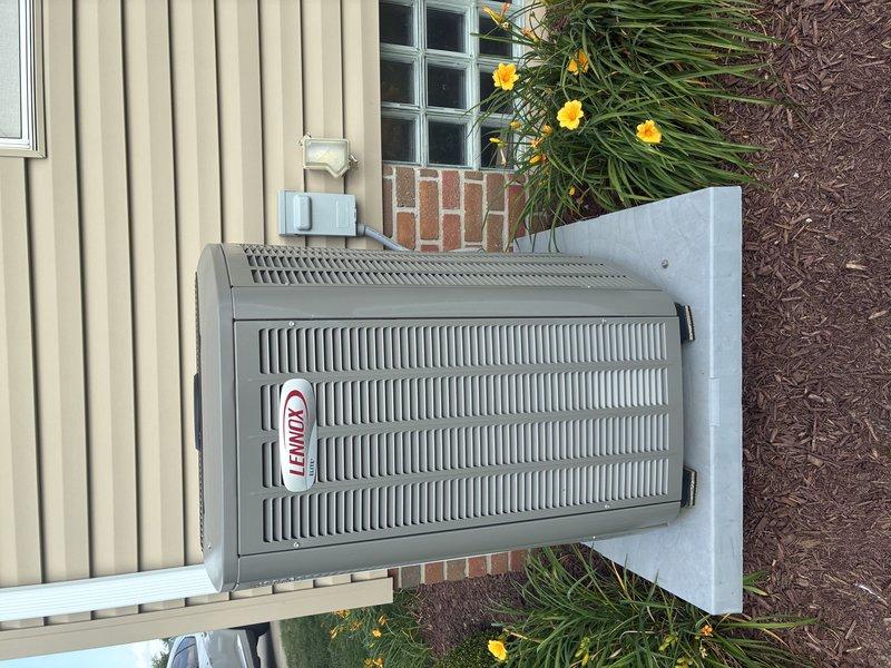 Completed scheduled preventive maintenance cooling visit on residential Lennox HVAC system. Performed comprehensive system inspection including electrical measurements using digital multimeter to verify proper voltage and amperage at heating elements and outdoor condensing unit. Inspected outdoor unit positioned on concrete pad, confirmed proper airflow through cabinet louvers, verified secure mounting and level installation. Checked electrical connections, PVC condensate line, and conduit installations at exterior wall penetrations. System operating within normal parameters with no deficiencies noted.