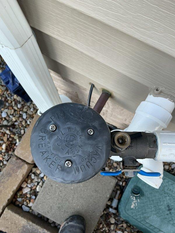 Completed annual backflow preventer testing and inspection on exterior pressure vacuum breaker assembly. Device tested within acceptable parameters, all test valves operated properly, and customer was provided with required certification paperwork for municipal compliance records.
