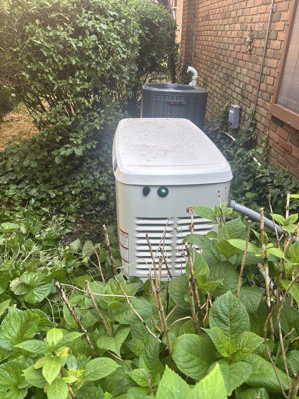 Performed scheduled maintenance on 12kW standby generator unit. Conducted comprehensive battery load test using digital analyzer, confirming battery health at 100% state of health with 754 CCA, 12.89V state of charge, and 6.97mΩ internal resistance - all readings within manufacturer specifications indicating good battery condition. Visually inspected generator enclosure, ventilation louvers, and associated electrical connections for proper operation and clearance from surrounding vegetation.