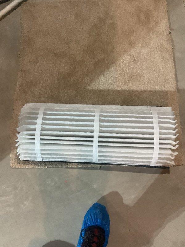 Completed scheduled MVP cooling maintenance visit on 6-year-old HVAC system. Inspected and documented air filter condition, which showed normal dust accumulation consistent with regular use. Verified air return grille installation and accessibility for proper system airflow.