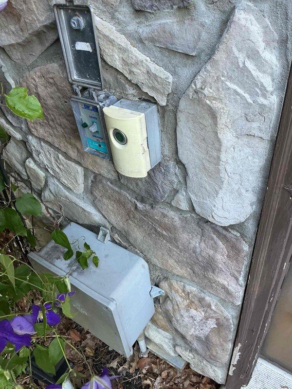 Installed electrical disconnect box and conduit for hot tub replacement on exterior stone wall, ensuring proper GFCI protection and code-compliant wiring. Additionally installed seven pendant light fixtures in kitchen area to complete electrical service request.