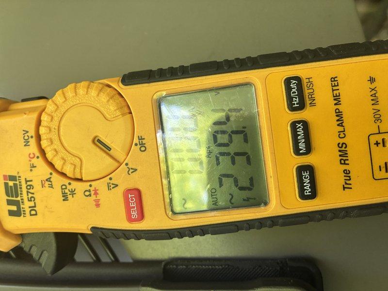 Completed routine preventive maintenance on 3-year-old air conditioning system. Inspected electrical components including dual-element time-delay fuses rated at 40A/250V AC in outdoor condensing unit, confirmed proper fuse operation and secure mounting. Measured system amperage draw of 67.32A using clamp meter to verify compressor and fan motor performance within manufacturer specifications. All components operating normally with no deficiencies noted.