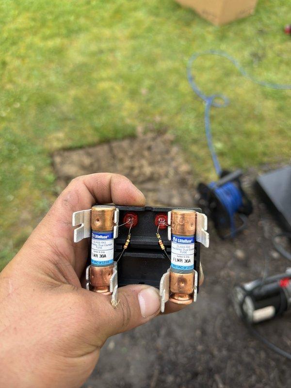 Completed installation of 80% AFUE gas furnace and air conditioning system. Installed new fuse block with proper amperage fuses and verified all electrical connections with appropriate wire gauging. Mounted and tested Kidde carbon monoxide alarm to ensure proper operation and safety compliance for new heating system installation.