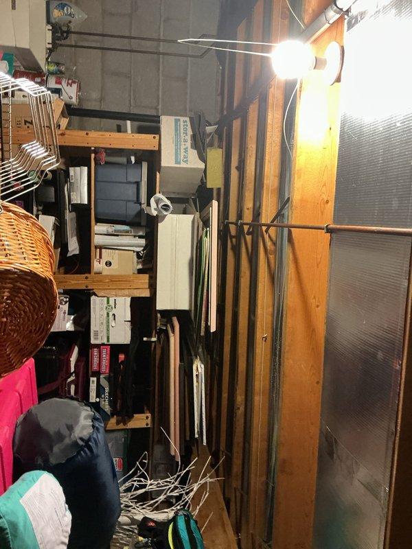 Conducted on-site assessment of existing water heater installation location in basement storage area to provide comprehensive estimate for both tankless and traditional tank-style water heater replacement options. Evaluated available space, existing plumbing connections, venting requirements, and electrical/gas utility access to determine feasibility and installation requirements for both system types.