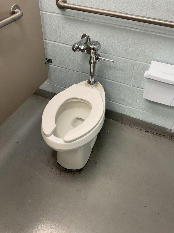 Responded to commercial facility reporting sewer odor emanating from multiple restrooms. Inspected plumbing fixtures and drainage systems in affected bathroom areas, including wall-mounted flush valve toilets and associated waste lines. Upon investigation, identified potential issues with drain trap seals or venting that could allow sewer gases to enter the building, and documented conditions of fixtures and surrounding infrastructure for further evaluation and remediation.
