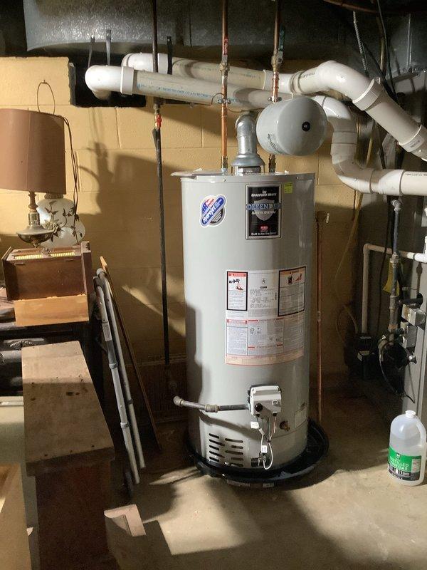Responded to service call for whole house water filtration system requiring piping reconnection. Upon arrival, assessed the water treatment equipment located in basement utility area alongside existing water heater and water softener unit. Successfully reconnected the plumbing lines to integrate the whole house water filter back into the main water supply system, restoring proper filtration functionality to the residence.