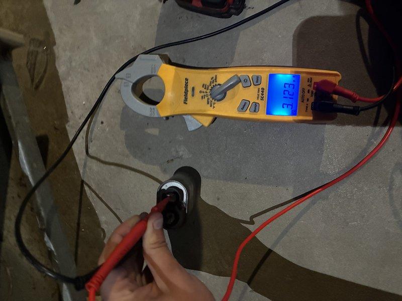 Responded to no cooling call on 18-year-old residential air conditioning system. Upon arrival, performed diagnostic evaluation of outdoor condensing unit and indoor air handler. Inspected air filter and found it required replacement due to restricted airflow. Utilized clamp meter to verify electrical readings at compressor and confirmed proper amperage draw. Tested capacitor values and verified contactor operation. System restored to proper cooling operation after completing necessary repairs and maintenance procedures. Homeowner advised of system age and potential future service needs given the unit's advanced years beyond typical equipment lifespan.