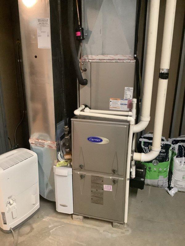 Completed BS-MVP preventive maintenance cooling visit on 10-year-old Carrier HVAC system with R-410A refrigerant. Performed comprehensive inspection of furnace unit, verified proper operation of associated dehumidifier, drainage system, and electrical components. All equipment operating within manufacturer specifications; documented system condition with photos for service records.