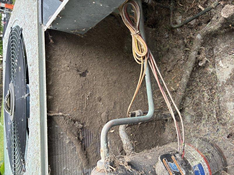 Responded to service call for air conditioning system not cooling adequately and water leakage at air handler. Upon arrival, performed comprehensive system diagnostic including refrigerant pressure testing and airflow evaluation of outdoor condensing unit. Inspected evaporator coil for proper drainage and identified source of water accumulation beneath furnace/air handler. Checked refrigerant line set connections and electrical components at outdoor unit. Verified system operation and cycling parameters to address extended run times and insufficient cooling capacity throughout home.