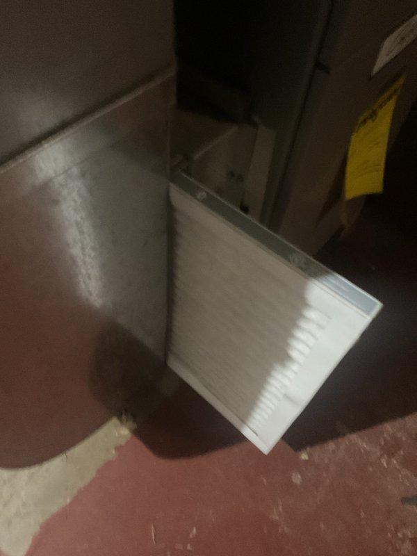 Completed cooling maintenance on first of two twin duplex units. Performed comprehensive system tune-up including temperature measurements, filter inspection and replacement, and verification of proper air handler operation. System tested and confirmed operating within normal parameters upon completion.