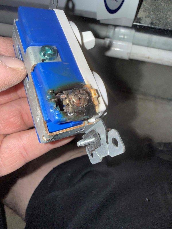 Responded to no-heat call affecting HVAC system operation. Upon inspection, discovered severe corrosion and electrical damage to furnace control sensor component, with visible burnt residue and oxidation on terminals. Removed and documented damaged blue-cased control device showing significant deterioration in central cavity. Inspected electrical panel and circuit breakers to verify proper power supply and safety interlock systems. System inoperable due to failed control component requiring replacement.