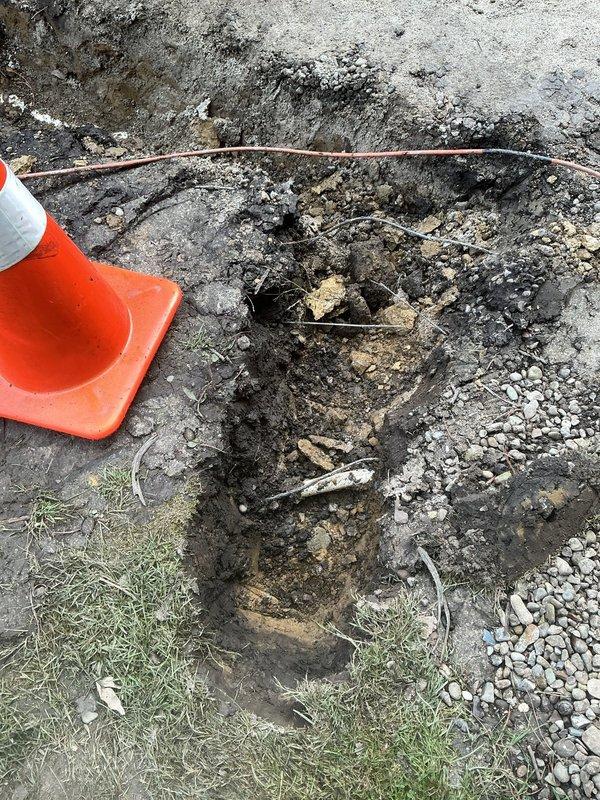 Responded to water leak discovered during patio renovation work. Upon arrival, located source of pooling water and excavated affected area to expose damaged underground piping. Identified burst pipe section with visible deterioration and corrosion. Removed damaged pipe segments, installed replacement piping, and tested system for proper flow and seal integrity. Backfilled excavation site and marked area with safety cones for customer awareness during ongoing patio construction.