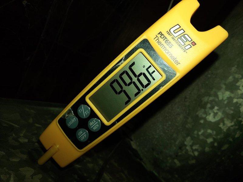 Completed first-time startup and commissioning of new air conditioning system with evaporator coil installation. Verified proper system operation using calibrated digital instruments, confirming supply air temperature of 99.6°F and recording refrigerant pressures for R454B refrigerant at 124.4 psi low side and 75 psi, with ambient conditions at 61°F and return air at 83.4°F, documenting baseline performance parameters for future reference.