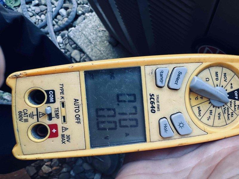Responded to no cooling complaint on 13-year-old air conditioning system. Performed diagnostic testing using digital multimeter, measuring voltage readings of 88.83V and 348V at outdoor unit to identify electrical fault in the system. Diagnosed and addressed the issue preventing proper AC operation, restoring cooling functionality to the unit.