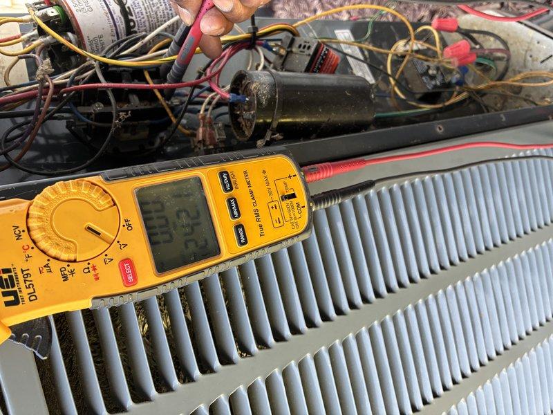 Completed scheduled preventive maintenance cooling inspection on 13-year-old HVAC system. Performed comprehensive electrical diagnostics using digital multimeter to test capacitor, evaporator coil circuits, and system components. All measurements verified within acceptable operating parameters, system operating efficiently with no deficiencies noted.