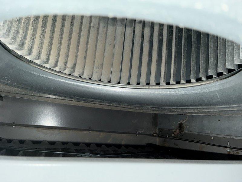 Completed routine maintenance on a 5-year-old air conditioning system. Inspected blower wheel assembly and evaporator coil, both showing normal operational condition with minor dust accumulation on blower fins. All components functioning properly with no issues identified requiring immediate attention.