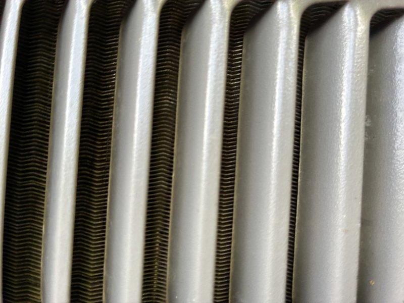 Completed routine maintenance on a 5-year-old air conditioning system. Inspected blower wheel assembly and evaporator coil, both showing normal operational condition with minor dust accumulation on blower fins. All components functioning properly with no issues identified requiring immediate attention.