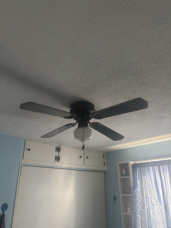 Installed and wired ceiling fan with integrated light fixture in bedroom, including proper electrical connections and mounting to ceiling junction box. Additionally assessed electrical infrastructure for potential installation of additional lighting fixture in adjacent room and provided recommendations for wiring requirements.