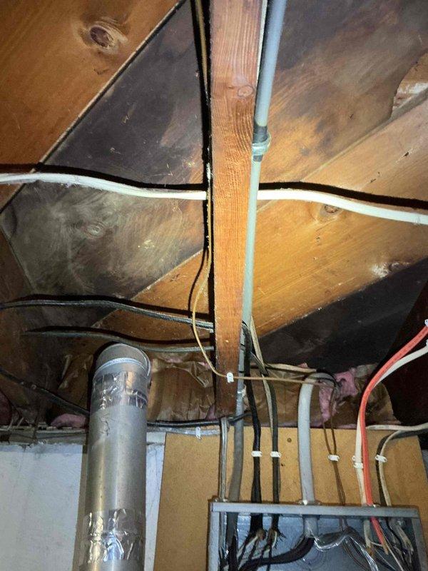 Replaced approximately 20 two-prong outlets with grounded three-prong outlets throughout a 1957 single-family residence. Verified proper grounding connections at each outlet location, as the home had existing ground wire with uncertain connectivity. Inspected electrical panel and ground wire routing through attic space to ensure code-compliant grounding system throughout the home.