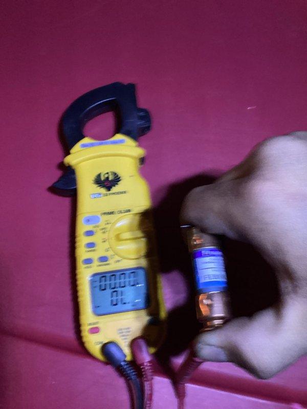 Responded to cooling complaint where thermostat reading remained at 82°F despite continuous system operation. Performed diagnostic assessment of HVAC system in basement location, including inspection of furnace unit, ductwork connections, and electrical components. Utilized digital clamp meter to verify electrical readings and system performance parameters to identify root cause of inadequate cooling issue that had been ongoing since property acquisition.