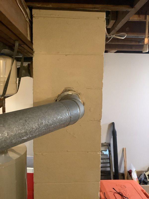 Conducted comprehensive on-site evaluation for furnace and air conditioning system replacement. Assessed existing HVAC infrastructure in basement utility area, including ductwork configuration, structural requirements, and current system placement. Documented existing galvanized ductwork penetrations through foundation walls, evaluated ceiling joist clearances for new equipment installation, and photographed current conditions to develop accurate replacement specifications and installation plan.