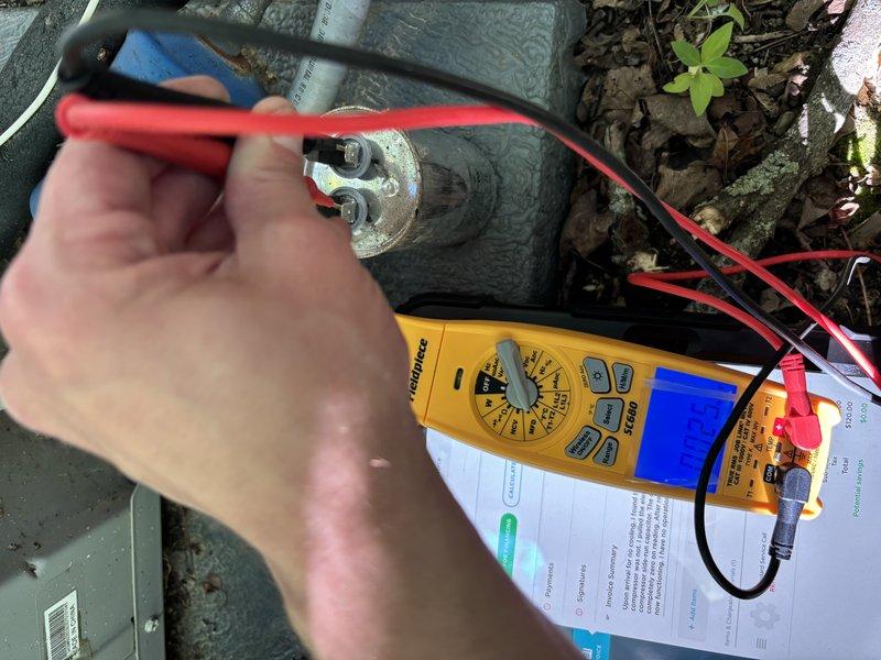 Responded to no cooling call on residential air conditioning system. Upon arrival, performed diagnostic testing on outdoor condensing unit. Used digital multimeter to test dual run capacitor, which showed failure and was unable to hold proper charge. Capacitor failure prevented compressor from starting, resulting in complete loss of cooling. Explained findings to customer and provided options for repair. Testing confirmed all other electrical components and connections were intact with no additional issues identified.