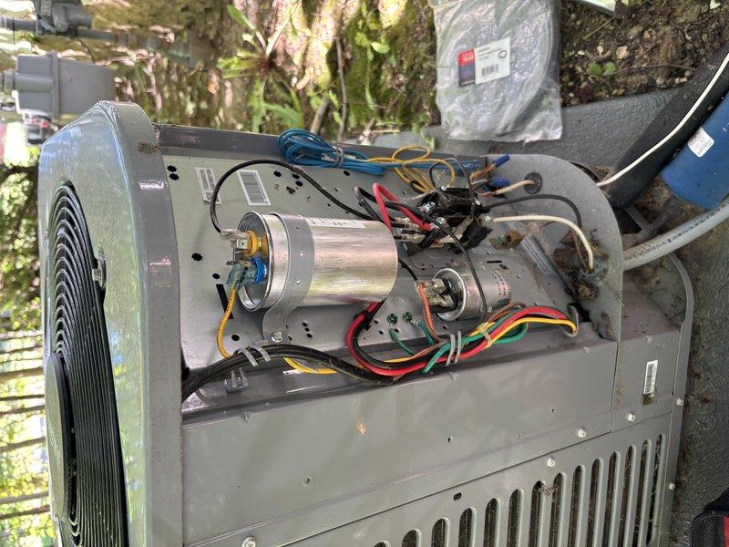 Responded to no cooling call on residential air conditioning system. Upon arrival, performed diagnostic testing on outdoor condensing unit. Used digital multimeter to test dual run capacitor, which showed failure and was unable to hold proper charge. Capacitor failure prevented compressor from starting, resulting in complete loss of cooling. Explained findings to customer and provided options for repair. Testing confirmed all other electrical components and connections were intact with no additional issues identified.