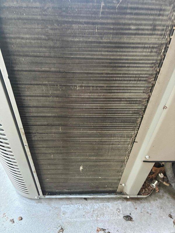 Completed first-time maintenance visit on an 8-year-old Lennox air conditioning system for MVP customer. Performed standard cooling season inspection of outdoor condensing unit, which showed normal accumulation of dirt, dust, and debris on condenser coils and surrounding concrete pad. Unit operational with refrigerant lines and electrical disconnect properly installed and functioning.