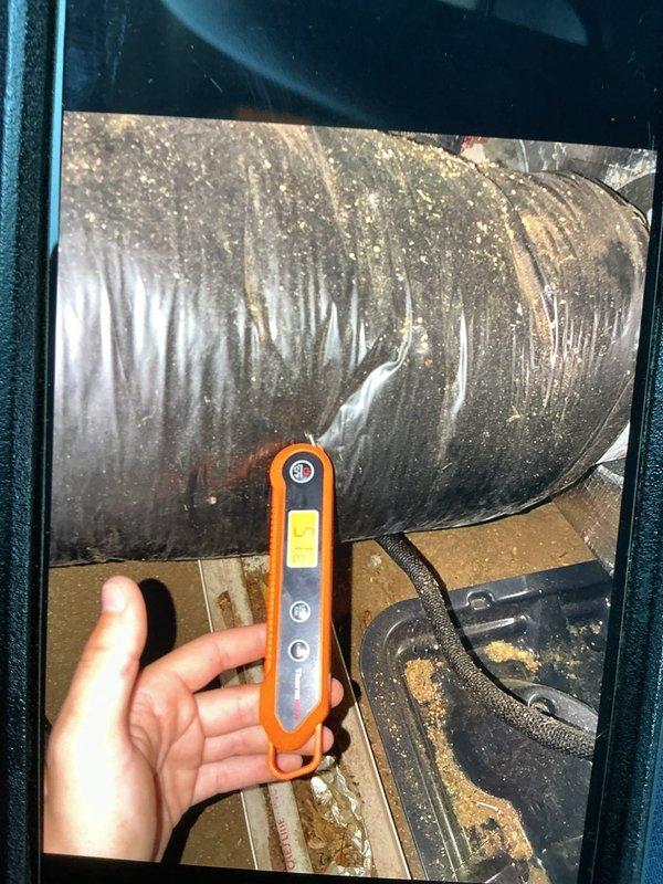 Responded to no cooling complaint on Lennox HVAC system. Performed diagnostic testing in attic space using electronic measuring instruments to assess system operation and refrigerant levels. Inspected ductwork and air handler components, noting dust accumulation on flexible duct system and surrounding areas. Evaluated unit specifications and operational parameters to identify cause of complete system failure and restore cooling functionality.
