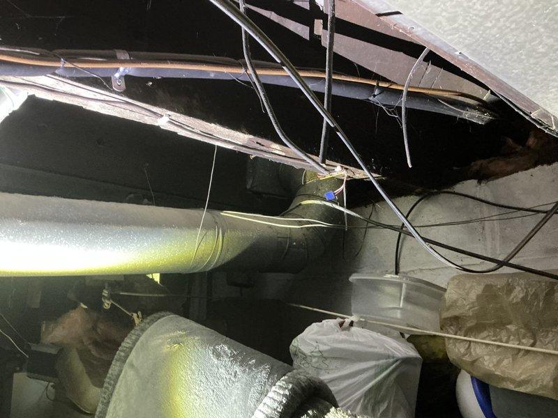 Completed estimate for air conditioning system replacement after unit sustained damage from fallen tree branches. Exterior condensing unit on concrete pad and interior ductwork in attic space were assessed and photographed to document existing conditions and determine full scope of replacement requirements.