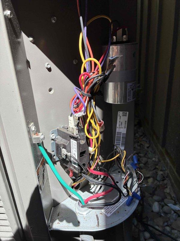 Completed routine cooling maintenance visit on 2-year-old air conditioning system. Performed comprehensive inspection of outdoor condensing unit electrical components including capacitor, contactor, and wiring connections, as well as indoor air handler unit with associated refrigerant lines and condensate drainage system. All components found operating within normal parameters and system tested successfully.