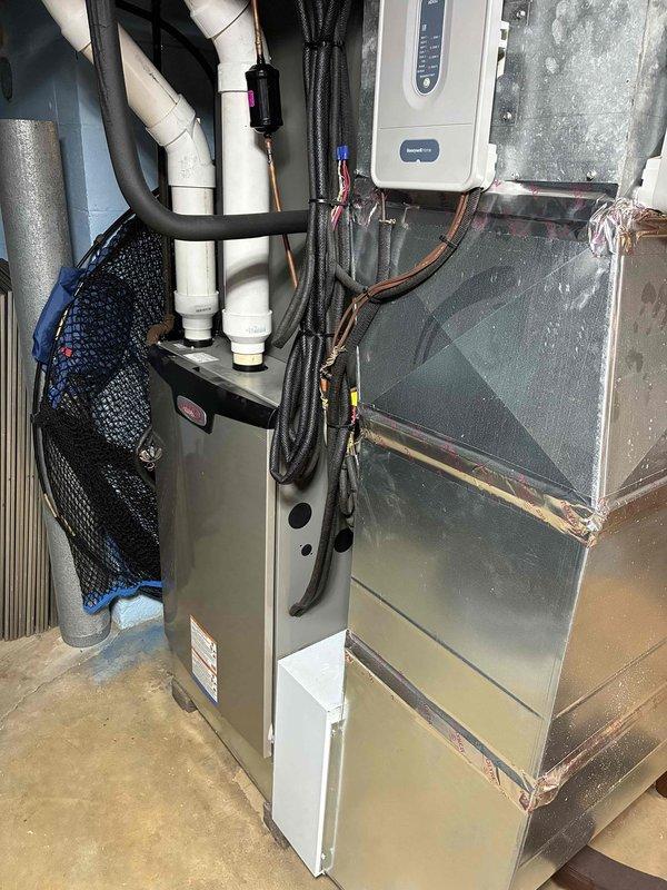 Completed routine cooling maintenance visit on 2-year-old air conditioning system. Performed comprehensive inspection of outdoor condensing unit electrical components including capacitor, contactor, and wiring connections, as well as indoor air handler unit with associated refrigerant lines and condensate drainage system. All components found operating within normal parameters and system tested successfully.