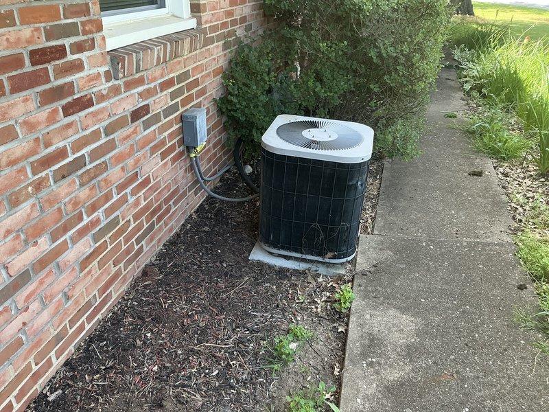 Completed on-site estimate for full HVAC system replacement including furnace and air conditioning unit. Evaluated existing 30+ year-old equipment located in basement utility room, including air handler, humidifier, and associated ductwork. Assessed outdoor condensing unit positioned on concrete pad with electrical disconnect. Documented current system configuration and provided replacement quote for complete heating and cooling system upgrade.