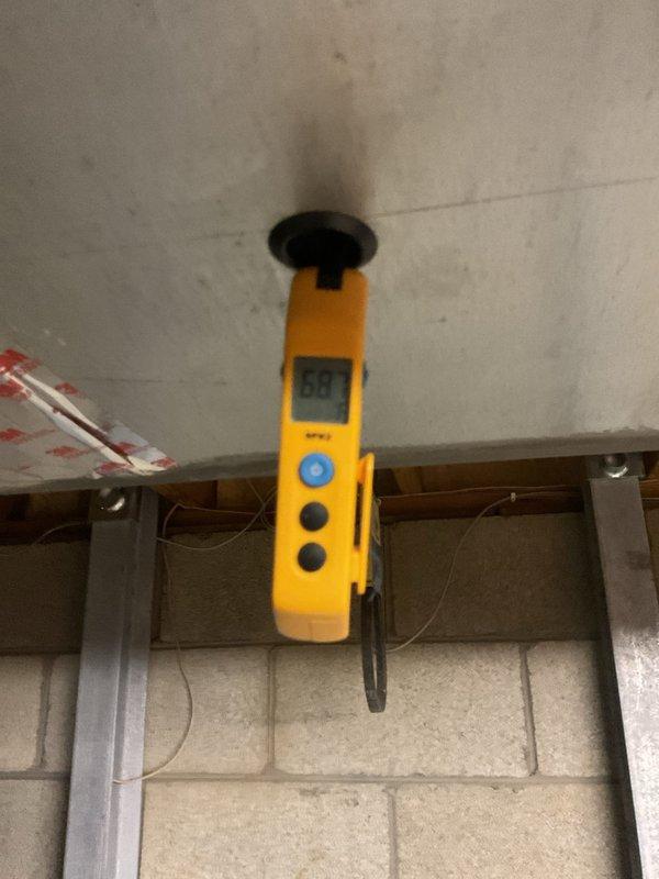 Completed annual AC tune-up for MVP member at residential property. Performed comprehensive system inspection including temperature differential testing, which showed 68°F reading at supply register. Inspected outdoor condensing unit and noted significant rust and corrosion on base plate and internal components, indicating extended outdoor exposure and potential moisture accumulation issues. Verified electrical connections, capacitor functionality, and all wire terminations. System operational at time of departure, though unit age unknown and corrosion may require future attention for component longevity.