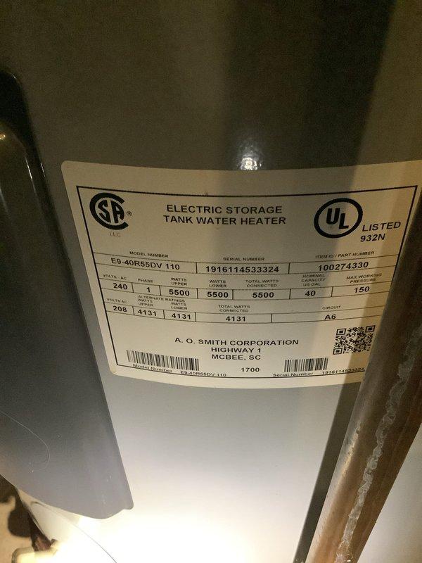 Conducted on-site evaluation and provided estimate comparison between tankless water heater installation versus traditional tank water heater replacement. Documented existing 40-gallon A.O. Smith electric storage tank water heater (Model E9-40R55DV 110) with detailed photographs of unit specifications including 240V, single-phase, 5500-watt configuration. Assessed current plumbing infrastructure, including water pressure monitoring system with Watts pressure gauge reading approximately 110-120 PSI at exterior connection point. Discussed upgrade options with customer regarding potential installation of 60-gallon tank unit versus tankless system, capturing comprehensive documentation to facilitate informed decision-making on water heating solution best suited for household demands.